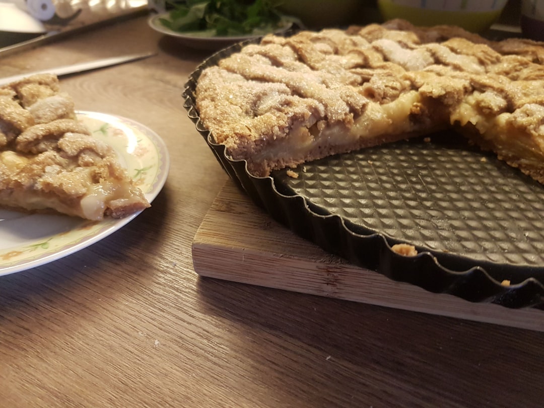 Homemade apple pie slice with golden crust